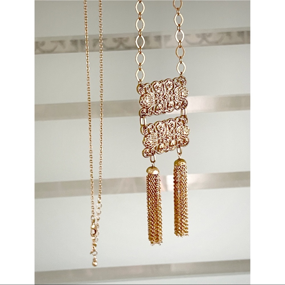 Matinee necklace with tassel and lace details